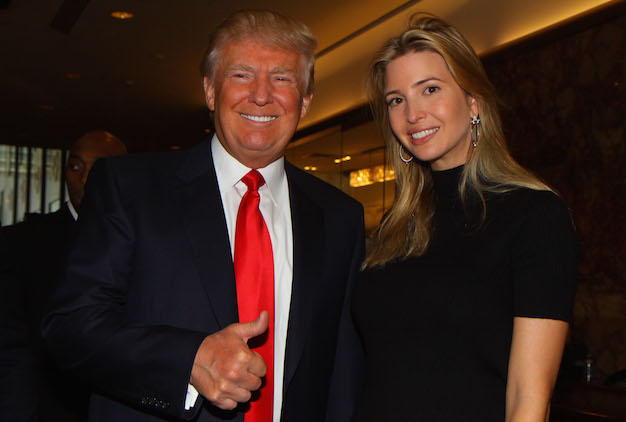 Donald Trump distributes free money at the launch of FundAnything.com at Trump Plaza.