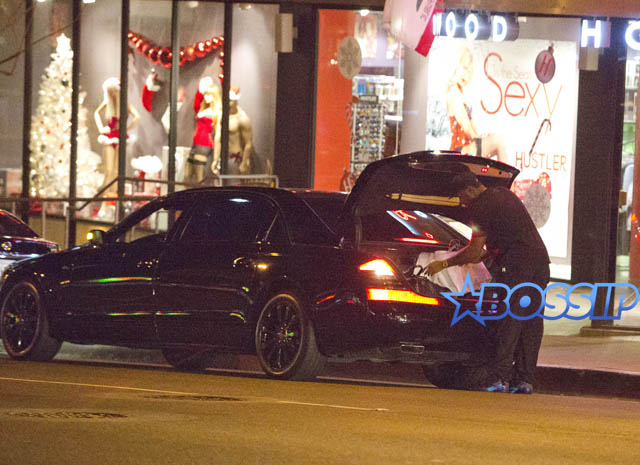 SplashNews Sean Combs &Kim Porter Shop At The Hustler Store
