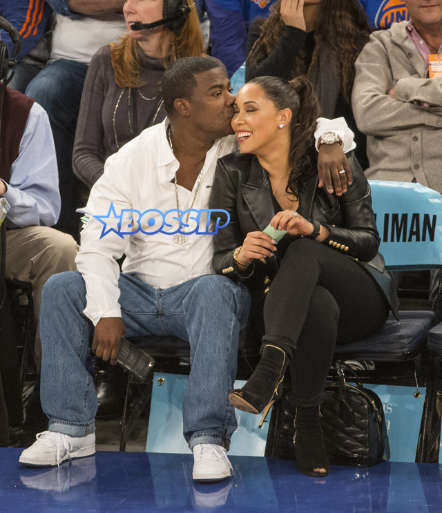 SplashNews Picture by Anthony J Causi Tracy Morgan wife Megan Wollover Madison Square Garden court side Knicks Thunder Brandon Marshall JB Smoove kiss