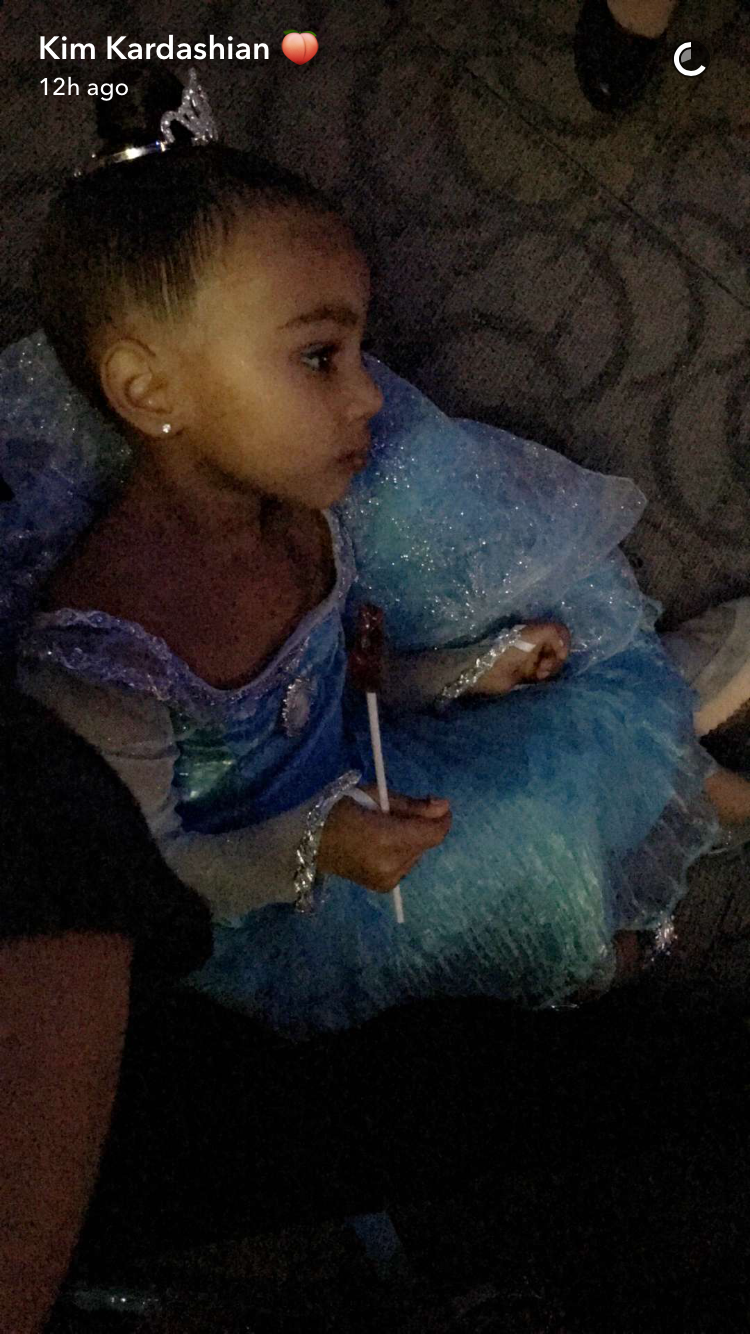 Kim Kardashian snapchats North West Penelope Disick Ryan Romulus Disneyland