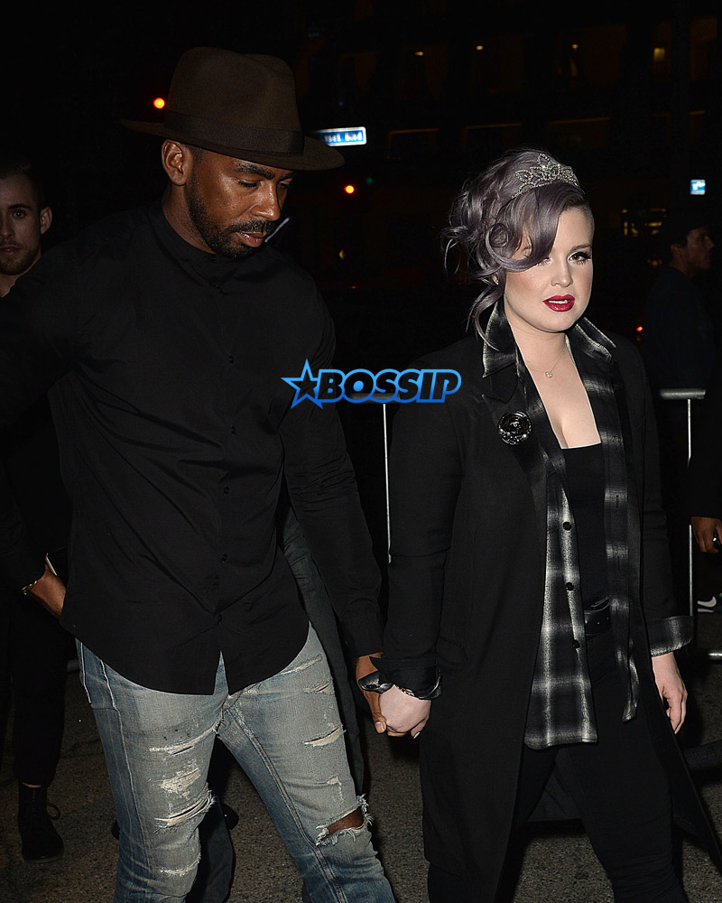 SplashNews Kelly Osbourne holds hands with stylist Jason Bolden for YSL Beauty Muse party for Zoe Kravitz