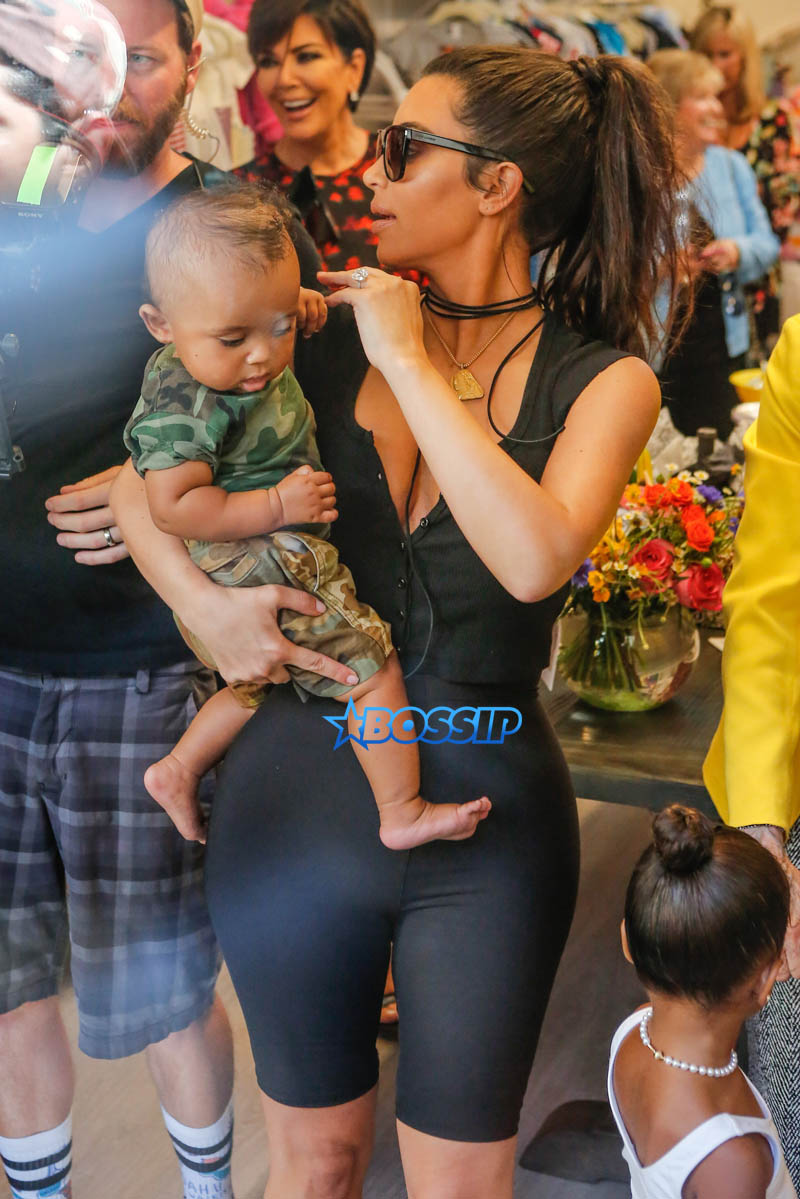 Kim, Kourtney and Khloe Kardashian attend their grandmother Mary Jo Campbell's store opening in San Diego with mother Kris Jenner, Corey Gamble, Scott Disick and their children. Kim carried little Saint as Khloe walked with Nori, Mason and Penelope.   AKM-GSI 