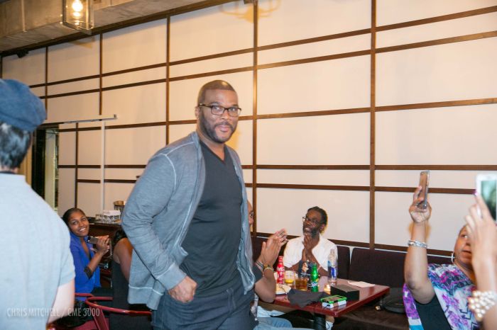 Tyler Perry walks in