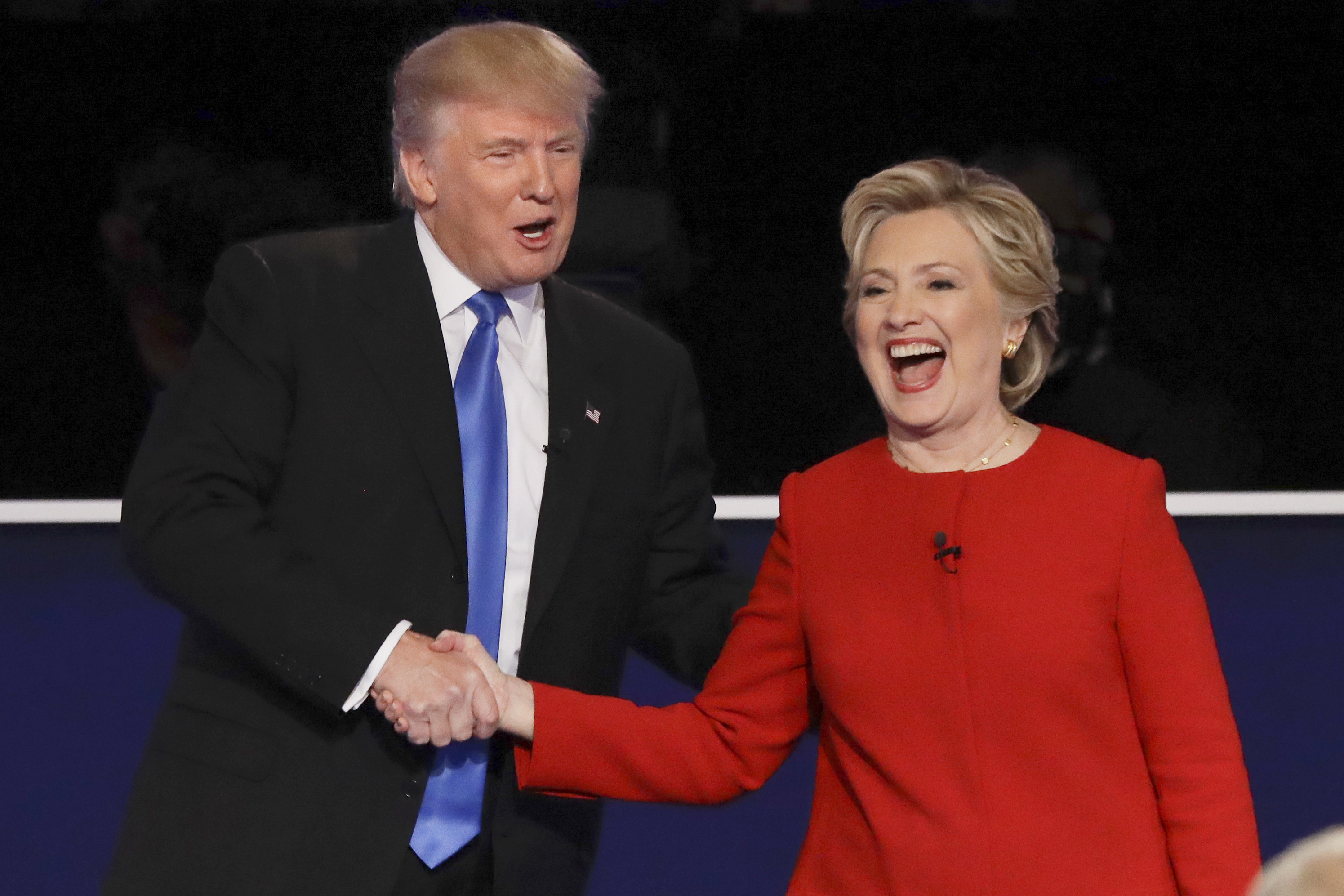 Republican presidential nominee Donald Trump and Democratic presidential nominee Hillary Clinton shake hands after the presidential debate at Hofstra University in Hempstead, N.Y., Monday, Sept. 26, 2016. (AP Photo/David Goldman)