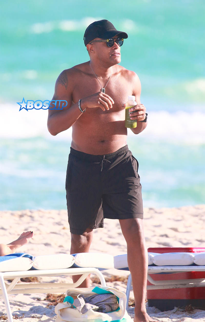 Maxwell afternoon at the beach with a new brunette girl in Miami Beach, FL. H rumored break up earlier this year w/ Lithuanian supermodel Deimante Guobyte. Maxwell, 43, blue bikini clad friend. SplashNews