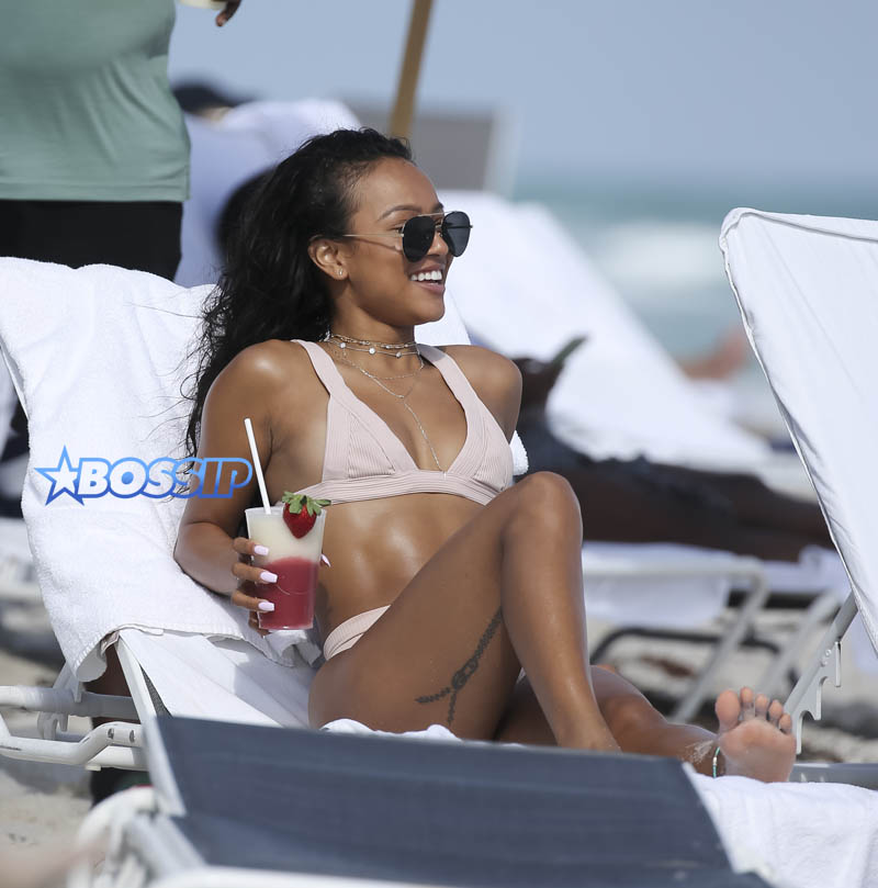 Chris Brown's ex Karrueche Tran pale pink bikini, Miami. SplashNews