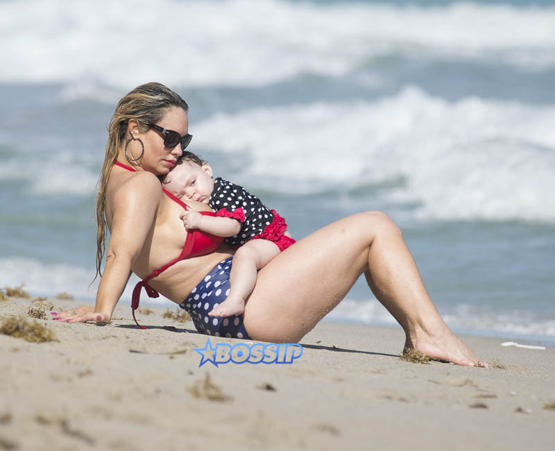 Coco Austin red white blue polka dot bikini body beach Miami baby Chanel on vacation with husband Ice T SplashNews