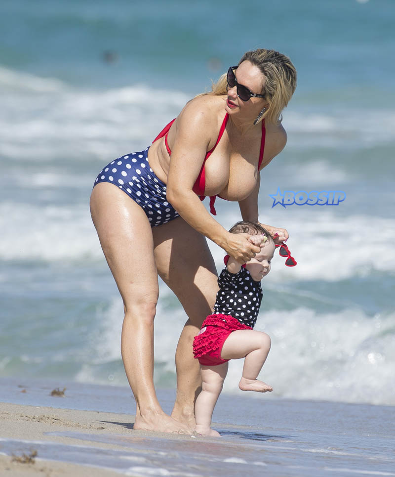Coco Austin bikini body beach Miami baby Chanel on vacation with husband Ice T SplashNews