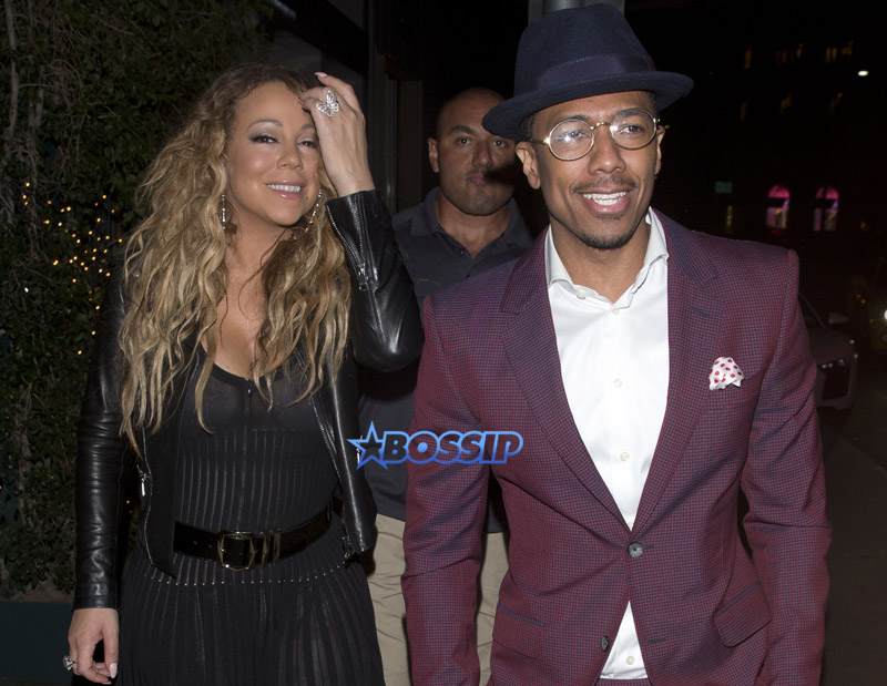 Mariah Carey Ex Husband Nick Cannon and their twin children for dinner at Mr. Chow Restaurant followed by frozen Yogurt at 'Pinkberry' in Beverly Hills, CA. Mariah wardrobe malfunction dress see-thru. Nick Maroon colored suit and a hat. SplashNews