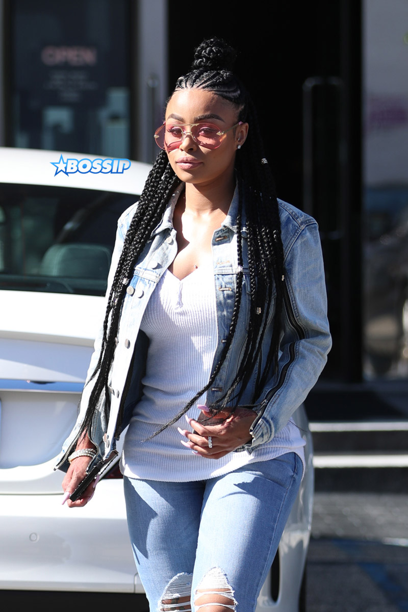 Blac Chyna rocks braids and denim after shopping for jewelry at XIV Karats in Beverly Hills, CA.