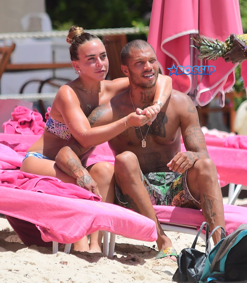 Hot Felon Jeremy Meeks t on the beach with his girlfriend, Topshop Heiress, Chloe Green. The couple packed on the PDA as they sat near the ocean in Barbados. jet ski, shower