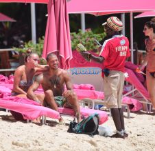 Hot Felon Jeremy Meeks t on the beach with his girlfriend, Topshop Heiress, Chloe Green. The couple packed on the PDA as they sat near the ocean in Barbados. jet ski, shower