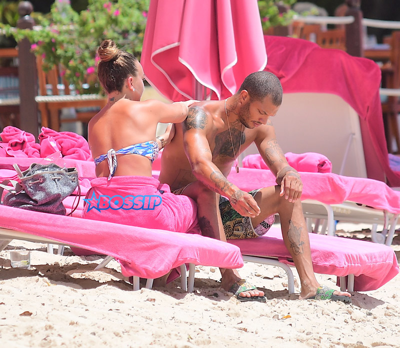 Hot Felon Jeremy Meeks t on the beach with his girlfriend, Topshop Heiress, Chloe Green. The couple packed on the PDA as they sat near the ocean in Barbados. jet ski, shower