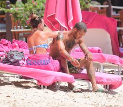 Hot Felon Jeremy Meeks t on the beach with his girlfriend, Topshop Heiress, Chloe Green. The couple packed on the PDA as they sat near the ocean in Barbados. jet ski, shower
