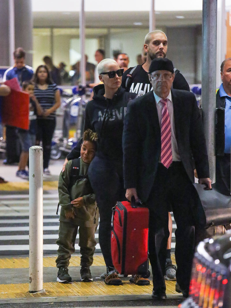 Amber Rose and son Sebastian Taylor Thomaz arriving at the Los Angeles International Airport.