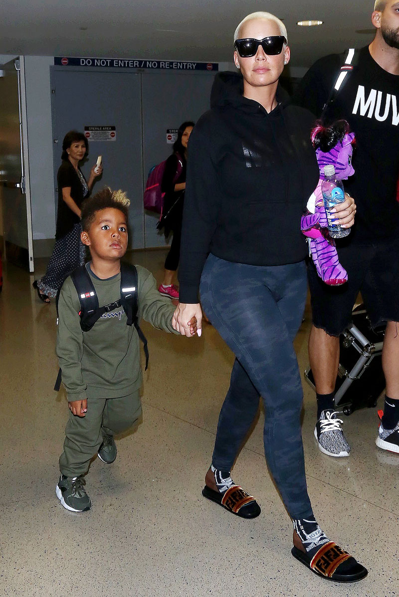 Amber Rose and son Sebastian Taylor Thomaz arriving at the Los Angeles International Airport.