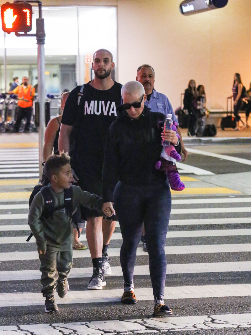 Amber Rose and her son Sebastian are seen at Los Angeles International Airport in Los Angeles, California.