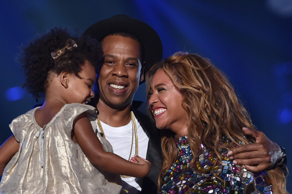 INGLEWOOD, CA - AUGUST 24: (L-R) Blue Ivy Carter, recording artists Jay-Z and Beyonce speak onstage during the 2014 MTV Video Music Awards at The Forum on August 24, 2014 in Inglewood, California.