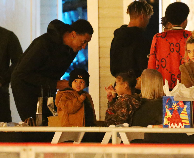 Kim Kardashian ice skating with North and son Saint at a Christmas party in Thousand Oaks,