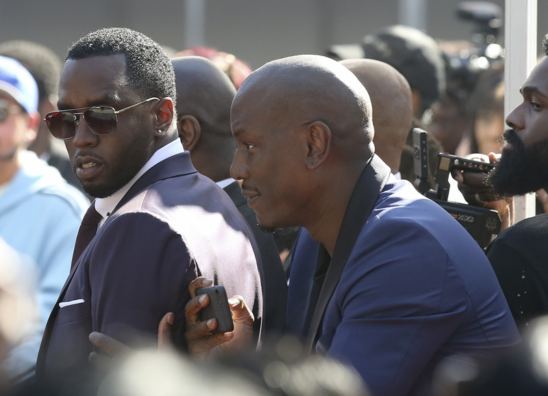 Sean Diddy Combs and Tyrese Gibson having fun at Mary J. Blige star ceremony in Los Angeles, California