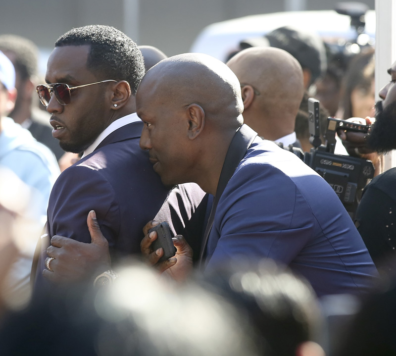 Sean Diddy Combs and Tyrese Gibson having fun at Mary J. Blige star ceremony in Los Angeles, California