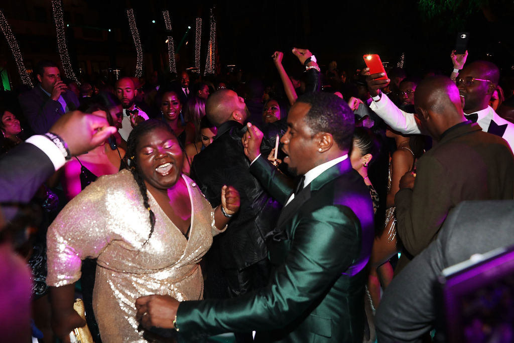 MIAMI, FL - DECEMBER 31: Gabourey Sidibe and Sean "Diddy" Combs attend Sean "Diddy" Combs Hosts CIROC The New Year 2018 Powered By Deleon Tequila at Star Island on December 31, 2017 in Miami, Florida.