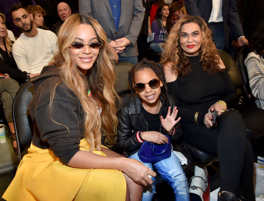 LOS ANGELES, CA - FEBRUARY 18:  (L-R) Beyonce, Blue Ivy Carter, and Tina Knowles attend the 67th NBA All-Star Game: Team LeBron Vs. Team Stephen at Staples Center on February 18, 2018 in Los Angeles, California. 