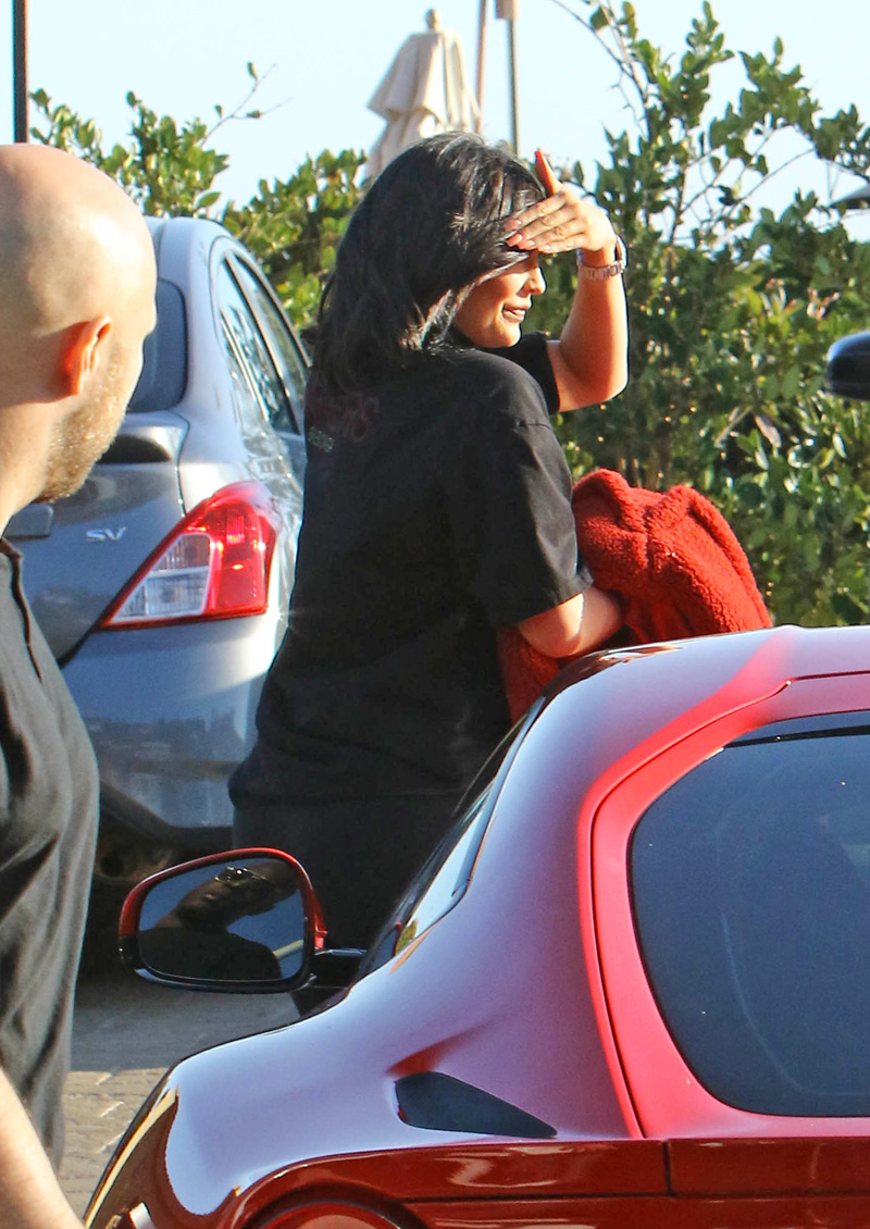 Kylie Jenner and Travis Scott dine with friends at Nobi in Malibu, CA. The new parents left the hotspot with a gang of security in toe as they made their way to their black LaFerrari super car. Recently a LaFerrari was auctioned off for 7.5 million dollars.