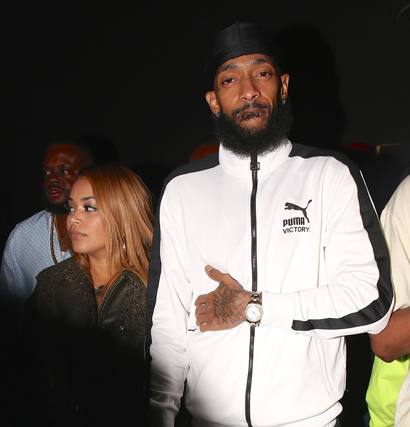 Rapper Nipsey Hussle and Lauren London. Arrive at the nice guy to celebrate nipsey new album.