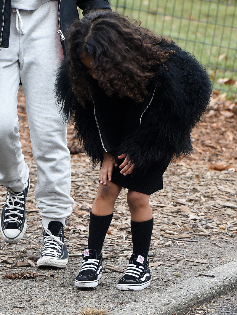 Kourtney Kardashian takes Penelope and North West to ice skating in Central Park, Little North West was seen taking a tumble on the ice several times and also scuffed her knee climbing rocks in Central Park