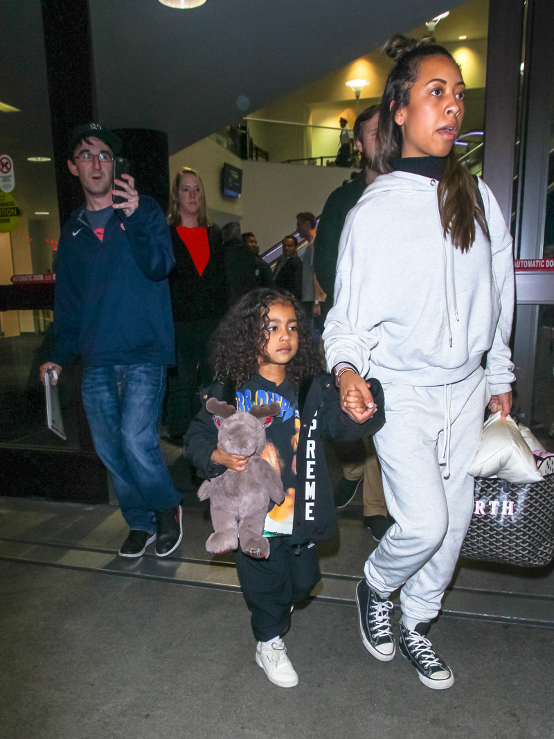 Kourtney Kardashian, daughter Penelope and her niece North West are seen in Los Angeles International Airport in Los Angeles. 