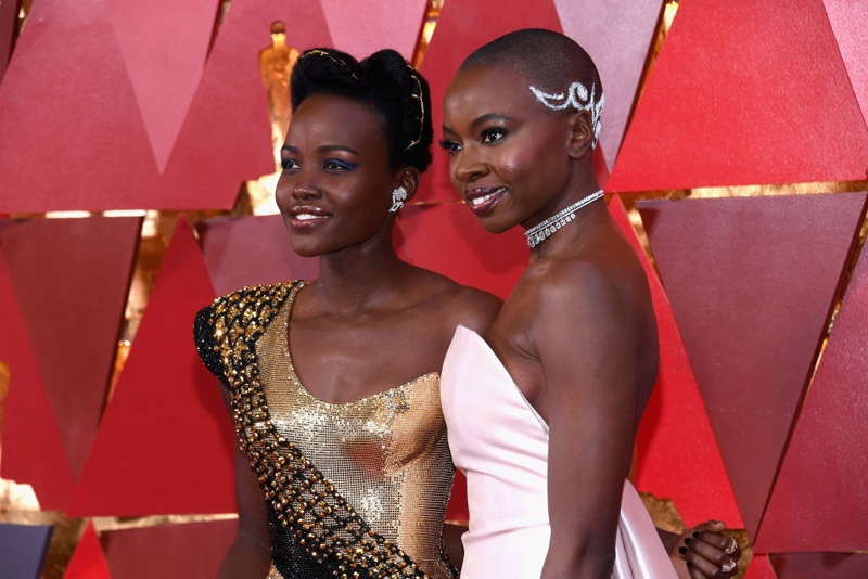 HOLLYWOOD, CA - MARCH 04: Lupita Nyong'o (L) and Danai Gurira attend the 90th Annual Academy Awards at Hollywood & Highland Center on March 4, 2018 in Hollywood, California. 