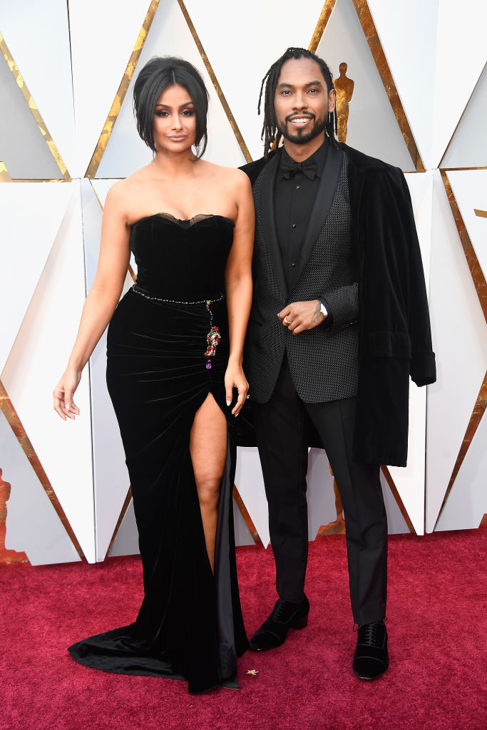 HOLLYWOOD, CA - MARCH 04: Nazanin Mandi (L) and Miguel attend the 90th Annual Academy Awards at Hollywood & Highland Center on March 4, 2018 in Hollywood, California.