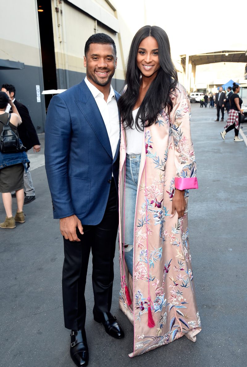 LOS ANGELES, CA - OCTOBER 14:  In this handout photo provided by One Voice: Somos Live!, NFL player Russell Wilson and singer Ciara pose backstage during "One Voice: Somos Live! A Concert For Disaster Relief" at the Universal Studios Lot on October 14, 2017 in Los Angeles, California. 