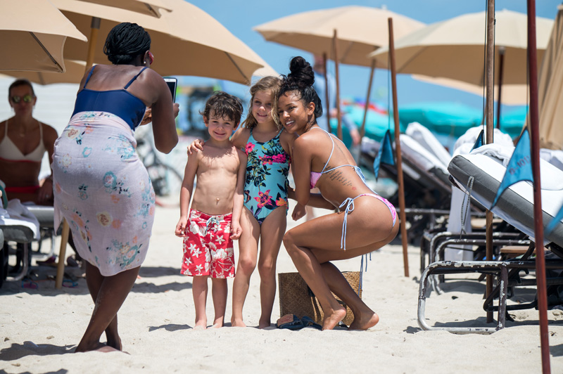 Karrueche Tran and her boyfriend NFL free agent Victor Cruz are seen during a beach day in Miami. Karrueche Tran was seen wearing a small golden necklace with her name written on it. The 29 year old actress has been filming her TNT show Claws.