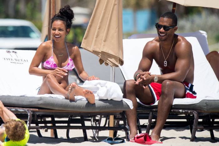 Karrueche Tran and her boyfriend NFL free agent Victor Cruz are seen during a beach day in Miami. Karrueche Tran was seen wearing a small golden necklace with her name written on it. The 29 year old actress has been filming her TNT show Claws.