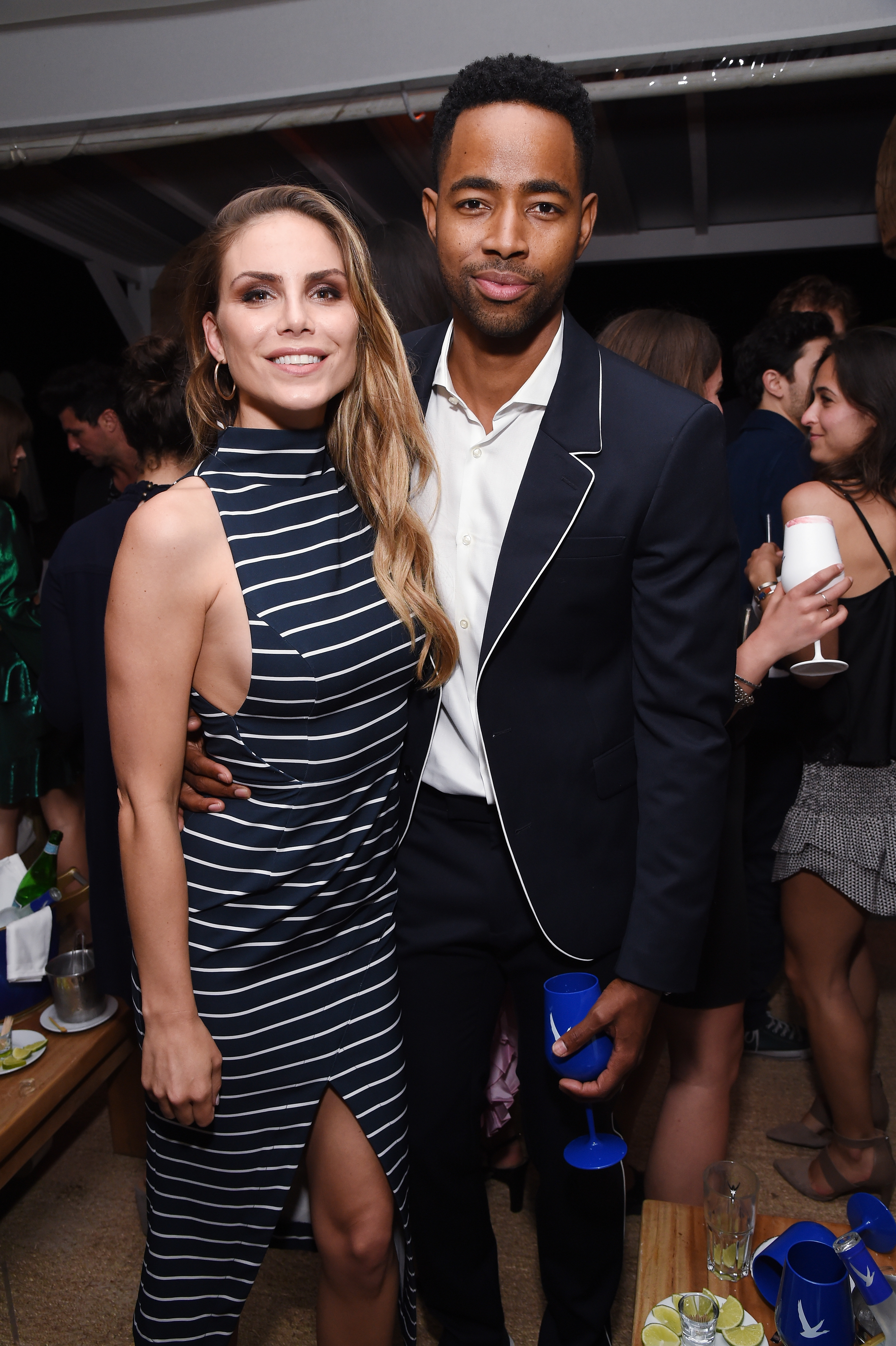 CANNES, FRANCE - MAY 11:  (L-R) Nina Senicar and Jay Ellis attend at Nikki Beach on May 11, 2018 in Cannes, France.