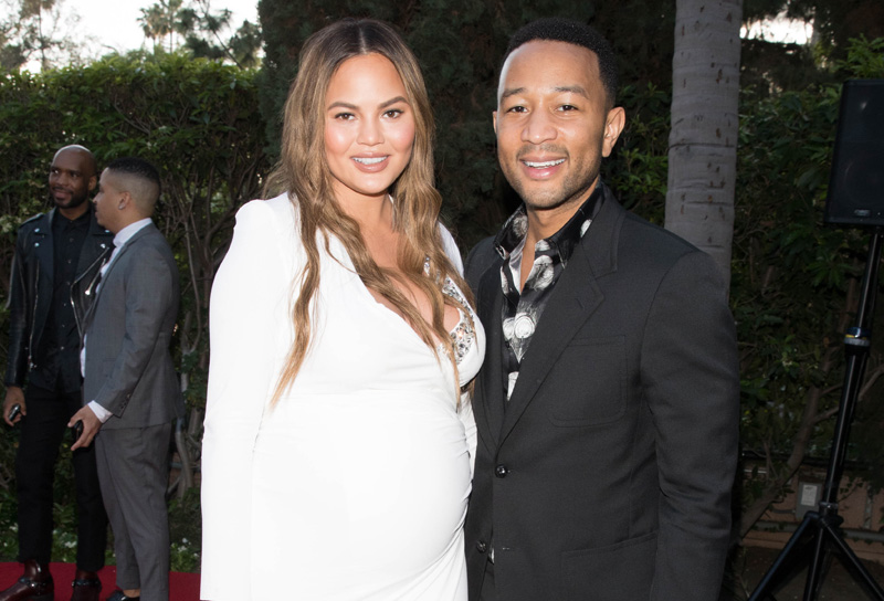 Chrissy Teigen and John Legend are both seen arriving to the Daily Front Row Awards held at the Beverly Hills Hotel