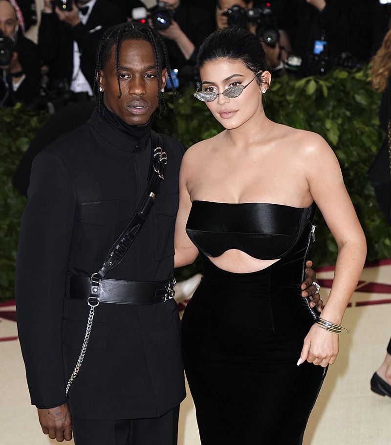 Kylie Jenner and Travis Scott at 2018 Met Gala celebrating the exhibition 'Heavenly Bodies: Fashion and the Catholic Imagination' at the Metropolitan Museum of Art in New York