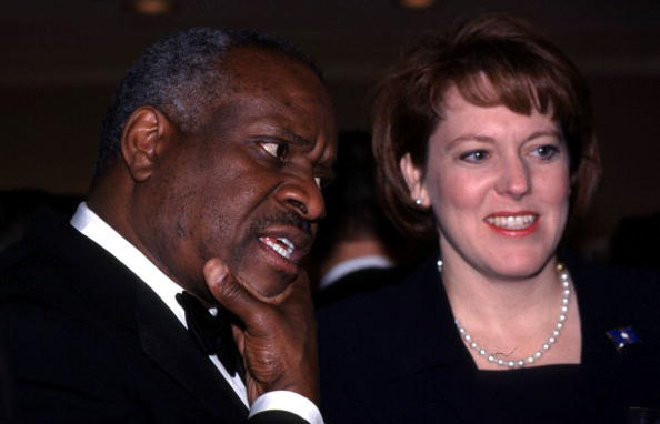 F365441 02: Supreme Court Justice Clarence Thomas and wife Virginia attend the American Enterprise Institute's annual dinner, February 15, 2000 in Washington, DC.
