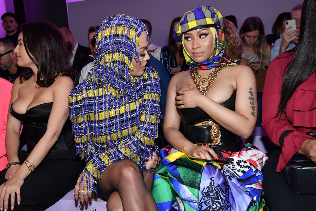 MILAN, ITALY - SEPTEMBER 21: Rita Ora and Nicki Minaj attend the Versace show during Milan Fashion Week Spring/Summer 2019 on September 21, 2018 in Milan, Italy. 