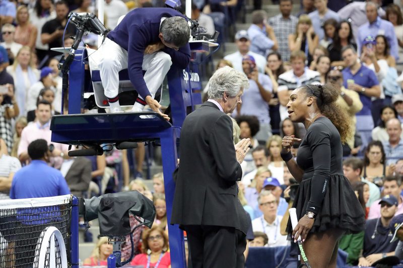 Tennis player Serena Williams talks to Umpire Carlos Ramos on his call of coaching against Williams at the 2018 U.S. Open in New York, NY. Afterwards, Williams pleaded her case to US Open officials Brian Earley, Tournament Referee and Donna Kelso, WTA Supervisor.