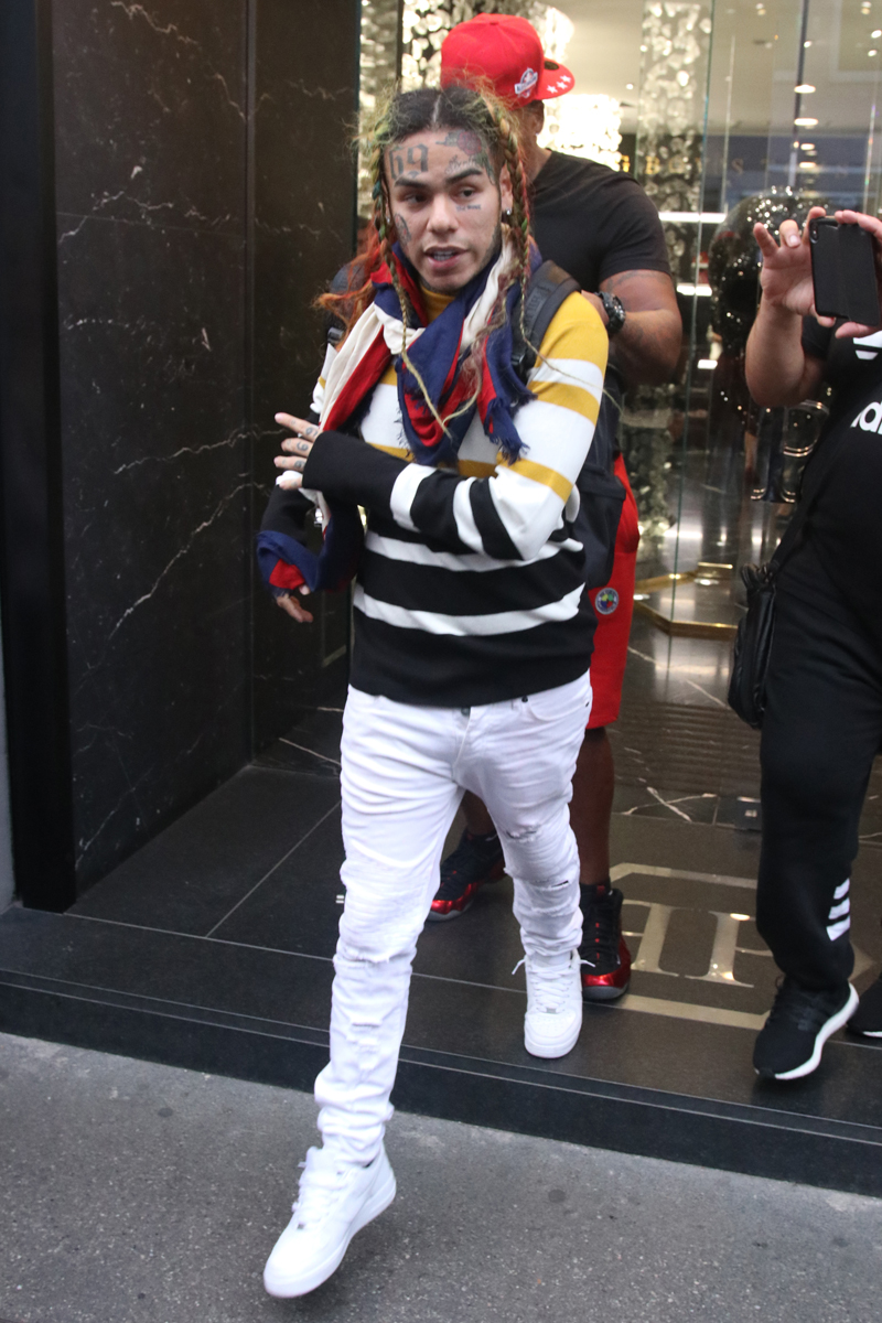 Tekashi 6ix9ine shoppping at Philipp Plein during Milan Fashion Week