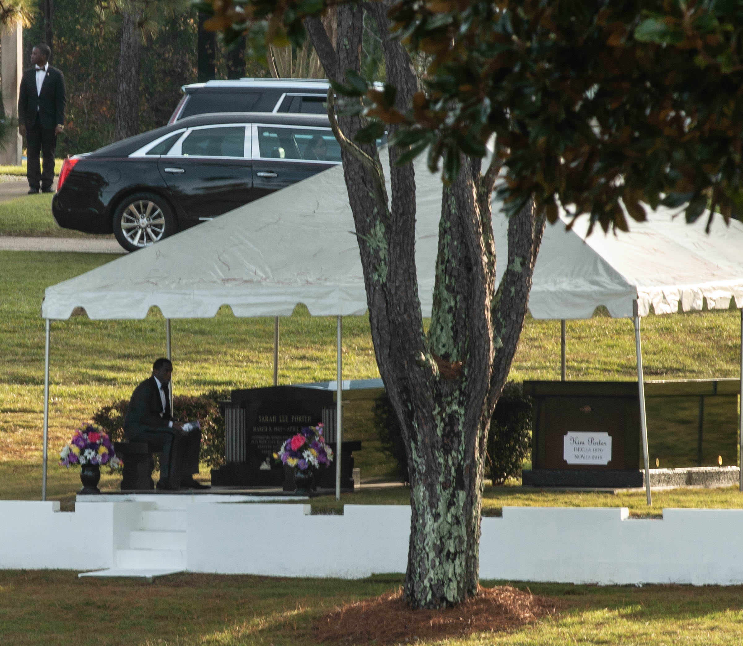 Diddy Mourns At Kim Porter's Gravesite