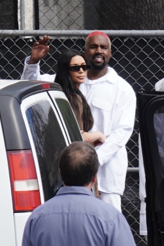 Kanye West Kim Kardashian Kourtney Kardashian and Khloe Kardashian leave his Sunday Service