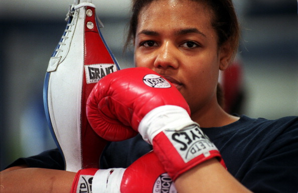 Boxer Freeda Foreman, daughter of former heaveyweight champion George Foreman, poses for a portrait at America Presents Gym in Denver.
