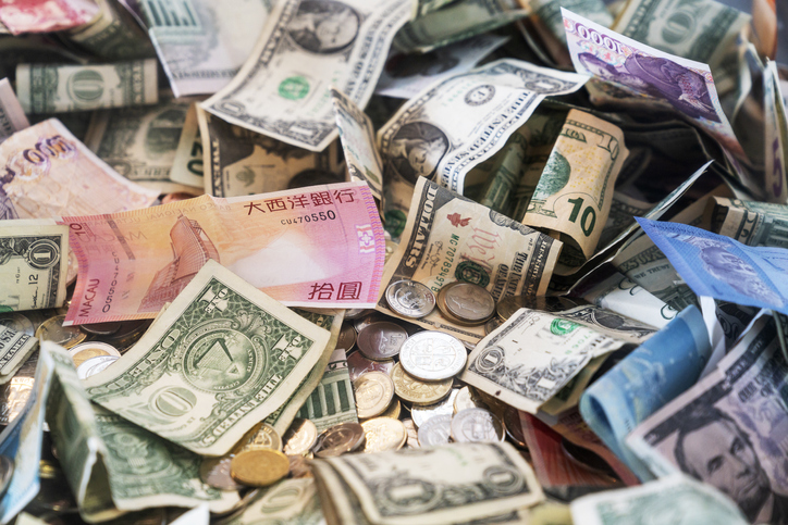 Donation box with a variety of currencies, Iceland