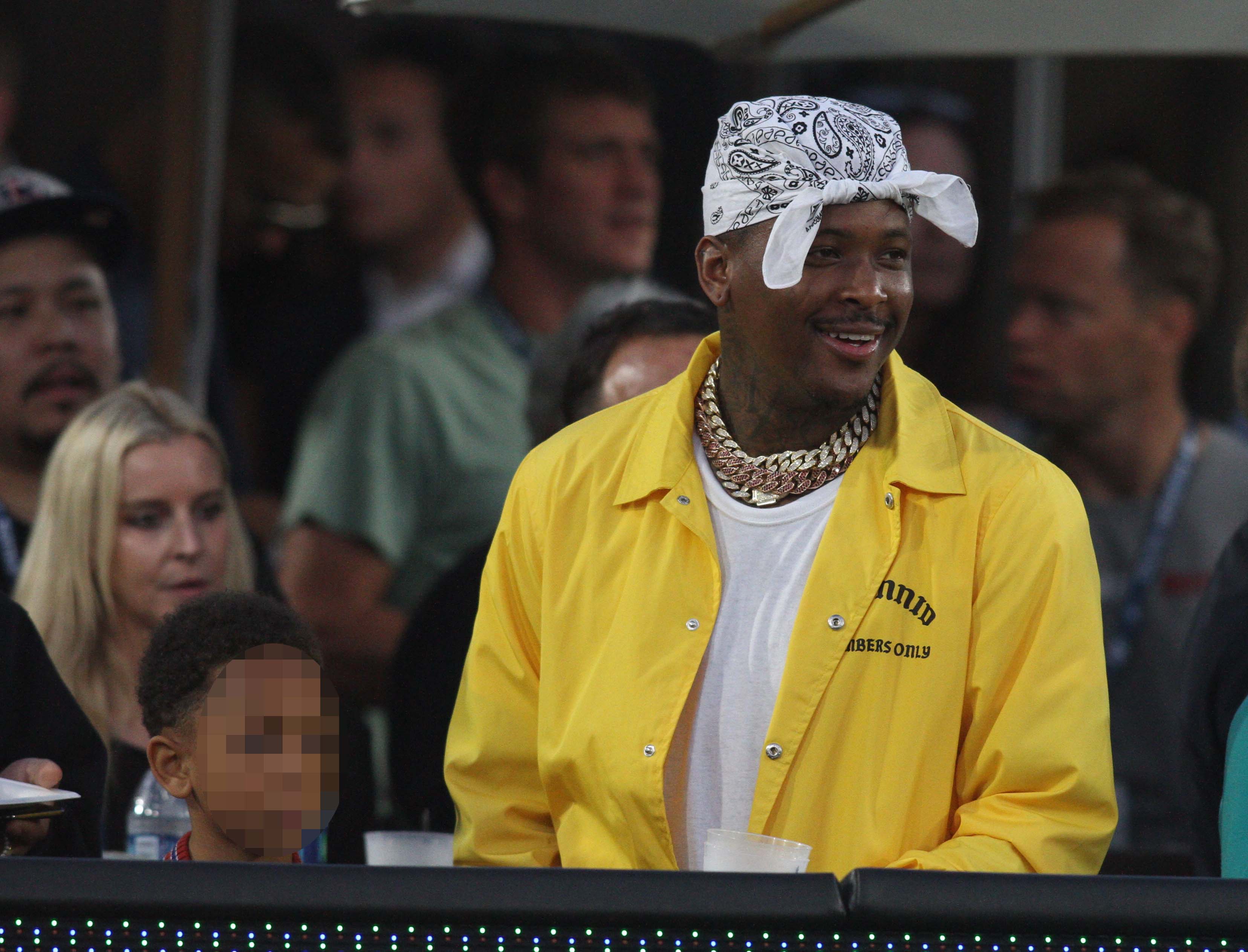 YG watches the Rams play