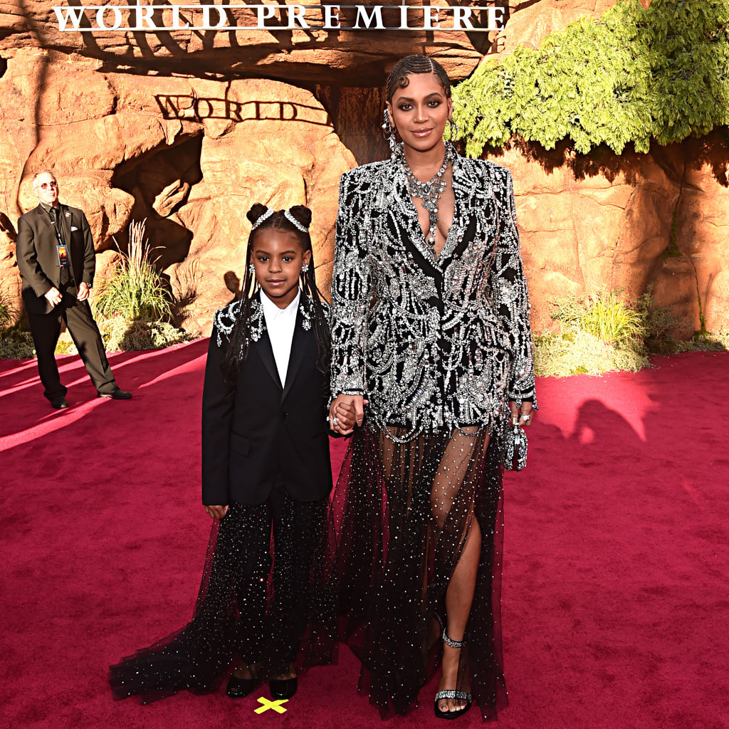 Blue Ivy Carter (L) and Beyonce Knowles-Carter attend the World Premiere of Disney's "THE LION KING"
