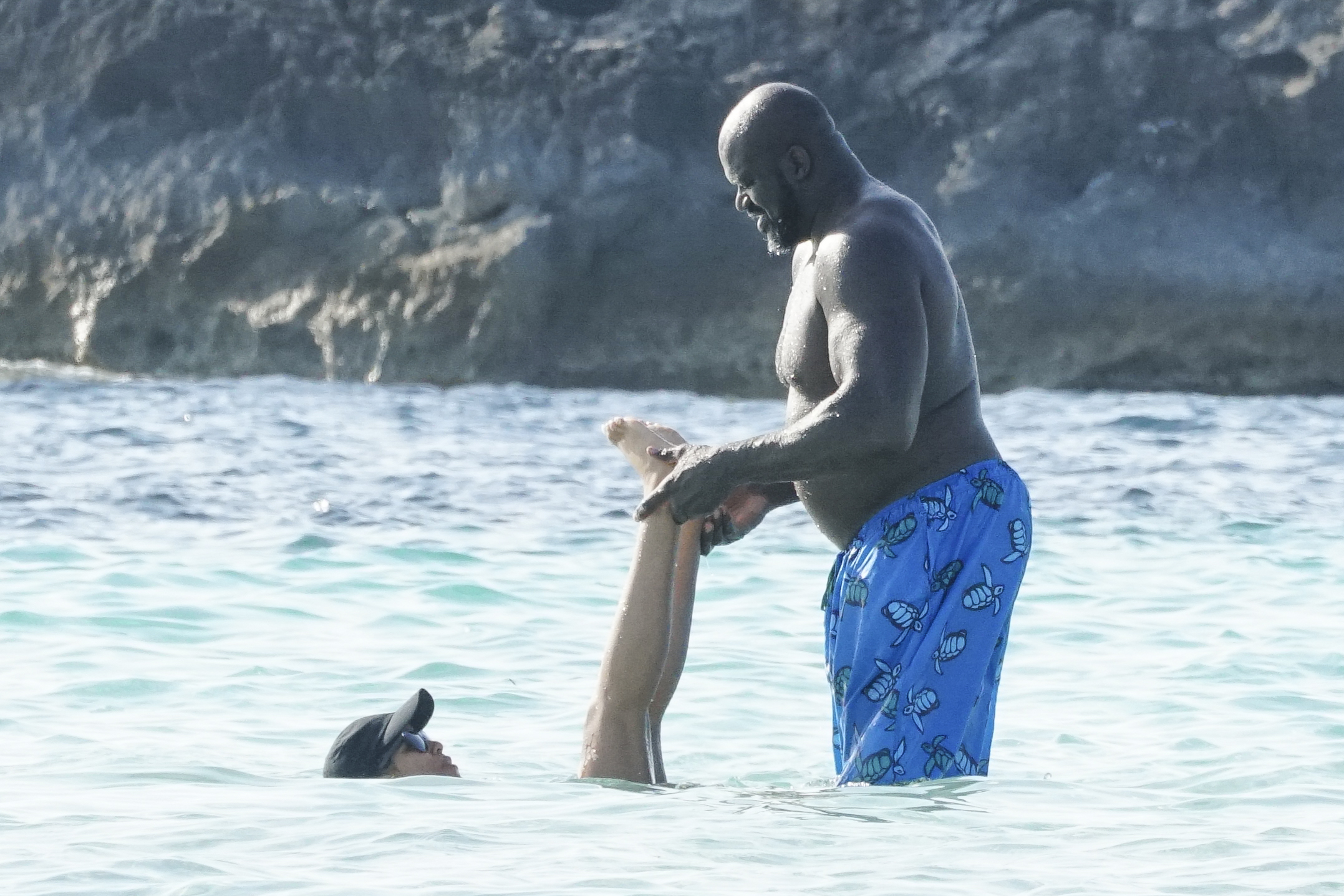 Shaquille O'Neal goes swimming in Formentera, Spain with new girlfriend